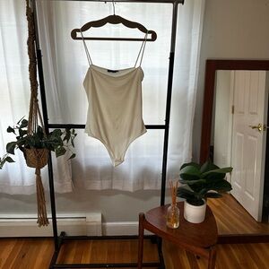 PrettyLittleThing Cream Sleeveless Bodysuit